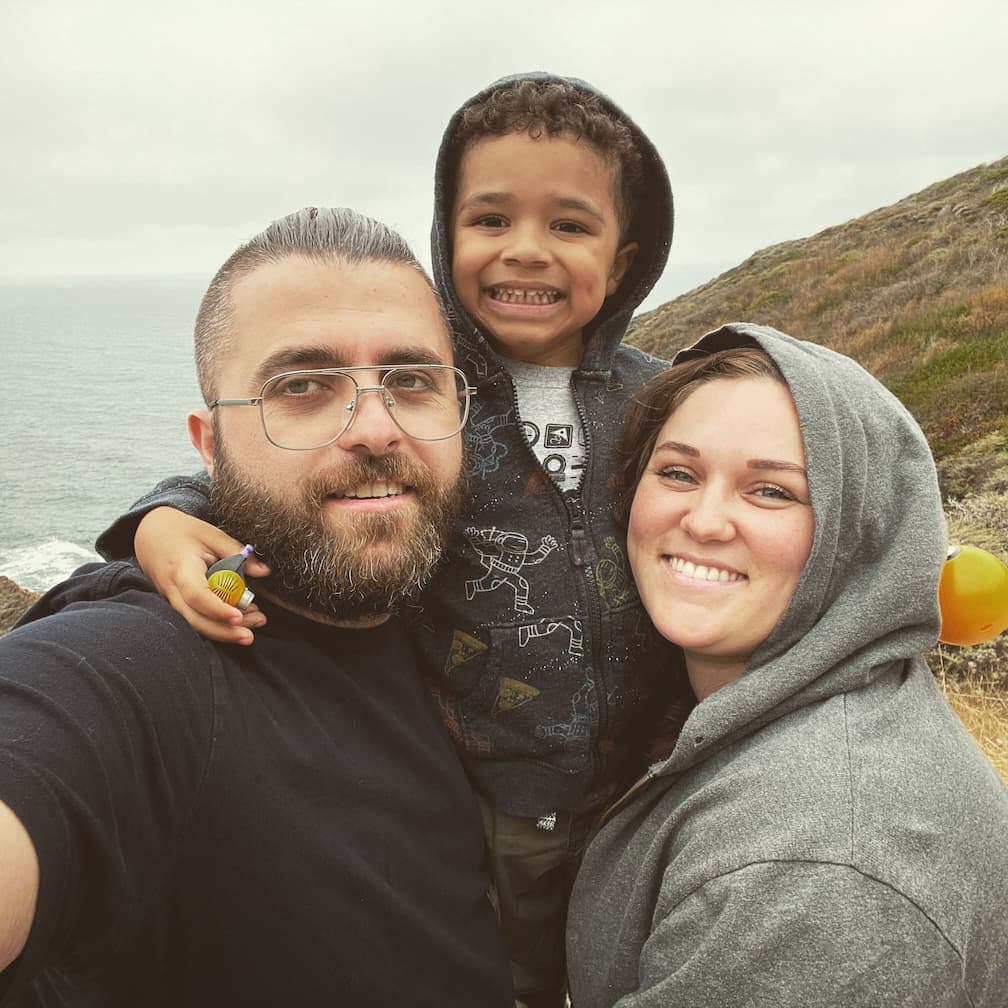 Cem and family near the ocean